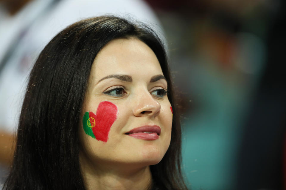 <p>A female fan of Portugal looks on prior to the 2018 FIFA World Cup Russia group B match between Portugal and Spain at Fisht Stadium on June 15, 2018 in Sochi, Russia. (Photo by Matthew Ashton – AMA/Getty Images) </p>