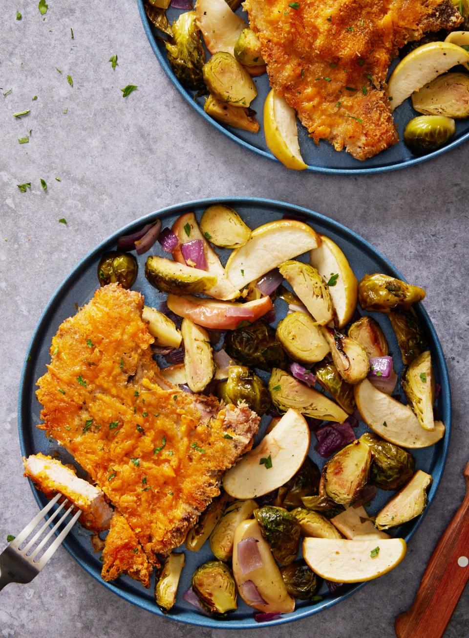 crispy cheddar pork chops with brussels and apples