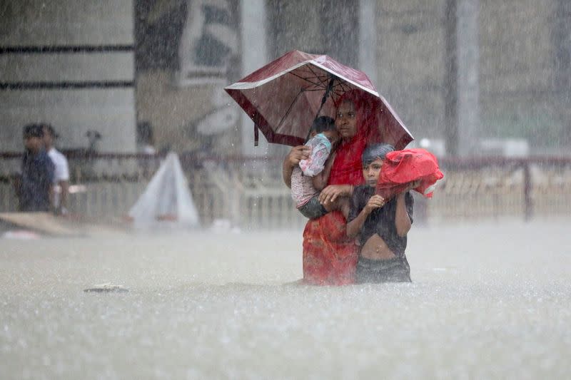 People look for shelter amidst flooding in Sylhet