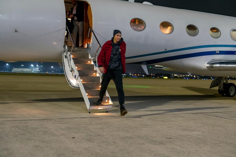 This photo provided by the U.S. Army shows WNBA star Brittney Griner arriving at Kelly Field in San Antonio following her release in a prisoner swap with Russia on Dec. 9, 2022.