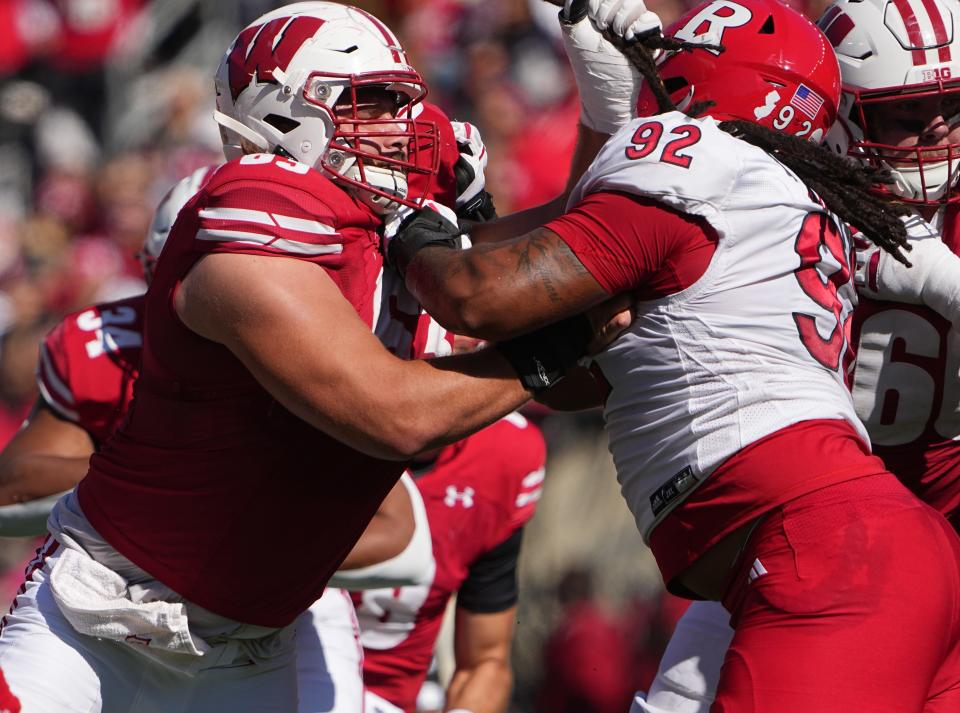 Wisconsin offensive lineman Tanor Bortolini (63) blocks Rutgers defensive lineman Mayan Ahanotu (92) during the second quarter of their game Saturday, October 7, 2023 at Camp Randall Stadium in Madison, Wisconsin.