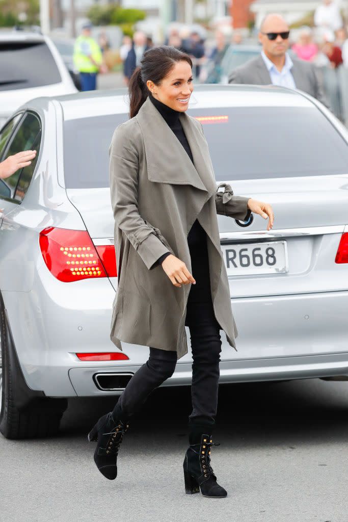 <p>For yet another appearance on the New Zealand tour in 2018, Markle wore a khaki trench from Club Monaco.</p>