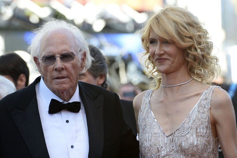 US actor Bruce Dern (L) and his daughter Laura Dern pose on May 23, 2013, as they arrive for the screening of the film "Nebraska" presented in Competition at the 66th edition of the Cannes Film Festival in Cannes. Dern won the best actor prize Sunday for his performance