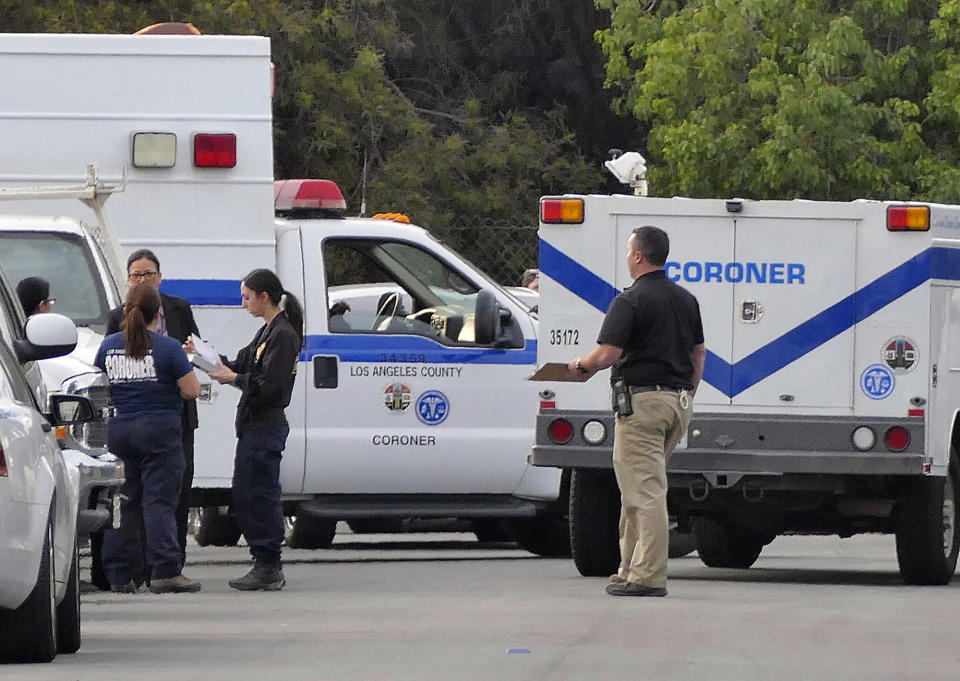 FILE - In this Tuesday, Dec. 20, 2016, file photo, police and coroner's officials investigate a home in the Lennox area of Los Angeles as they search for Lisa Marie Naegle, who has been missing since the previous weekend. A body believed to be that of the former reality show contestant was found buried in the backyard, after a man in one of her nursing classes pointed police to the shallow grave as they questioned him in the woman's disappearance, authorities said. Lisa Marie Naegle, 36, a nurse, was a losing contestant in 2010 on the E! network show "Bridalplasty," where she competed for a dream wedding and plastic surgery. (Brad Graverson/The Daily Breeze via AP)