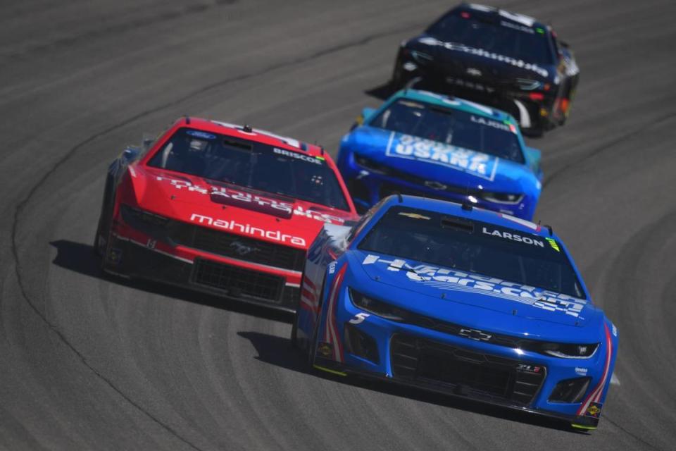 Mar 3, 2024; Las Vegas, Nevada, USA; NASCAR Cup Series driver Kyle Larson (5) leads a group during the Pennzoil 400 at Las Vegas Motor Speedway. Mandatory Credit: Gary A. Vasquez-USA TODAY Sports