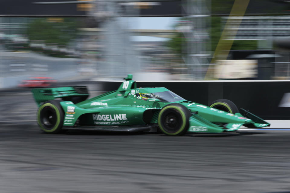 Alex Palou makes a turn during the IndyCar Detroit Grand Prix auto race in Detroit, Sunday, June 4, 2023. (AP Photo/Paul Sancya)