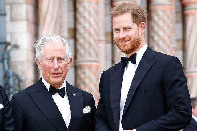 <p>John Phillips/Getty</p> King Charles and Prince Harry at the Natural History Museum on April 4, 2019 in London.
