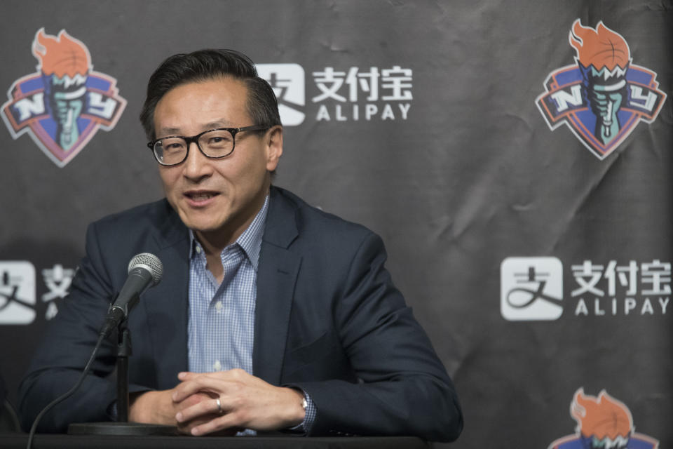 FILE - In this May 9, 2019, file photo, Joe Tsai, co-founder and executive vice chairman of Alibaba Group and the new owner of the New York Liberty, speaks to reporters during a news conference before a WNBA exhibition basketball game between the Liberty and China in New York. The Liberty will have a new home next year, playing their games at Barclays Center. The building was recently purchased by Liberty owner Tsai, who also owns the Brooklyn Nets. Playing in Barclays Center is a huge upgrade for the Liberty, who played the past two seasons at the Westchester County Center, where the capacity was set for just over 2,000 fans. (AP Photo/Mary Altaffer, File)