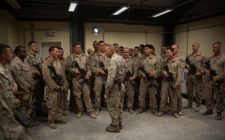 Commandant of the Marine Corps Gen. Robert B. Neller speaks with Marines with Task Force Southwest at Bost Airfield, Afghanistan, June 20, 2017. Picture taken June 20, 2017. Courtesy Justin T. Updegraff/U.S. Marine Corps/Handout via REUTERS