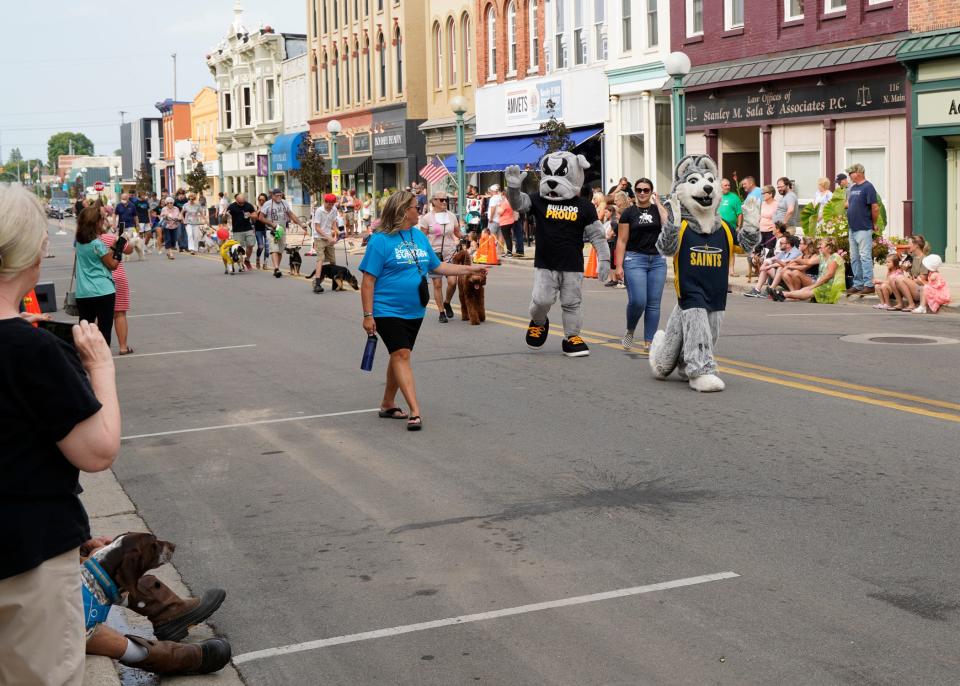 Adrian College's and Siena Heights University's mascots join the 2021 pet parade during First Fridays in downtown Adrian. The mascots will return for the 2022 pet parade as part of the Aug. 5 First Fridays.