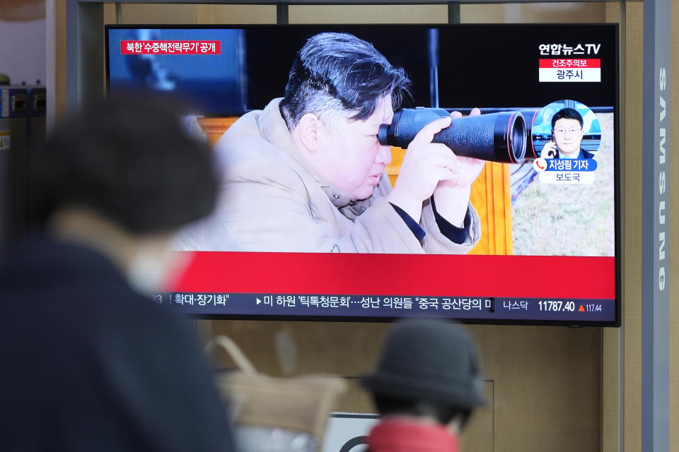 A TV screen shows an image of North Korean leader Kim Jong Un during a news program at the Seoul Railway Station in Seoul, South Korea, Friday, March 24, 2023. North Korea said Friday its latest cruise missile launches this week were part of nuclear attack simulations that also involved a test of a purported underwater attack drone as leader Kim Jong Un vowed to make his rivals "plunge into despair." (AP Photo/Lee Jin-man)