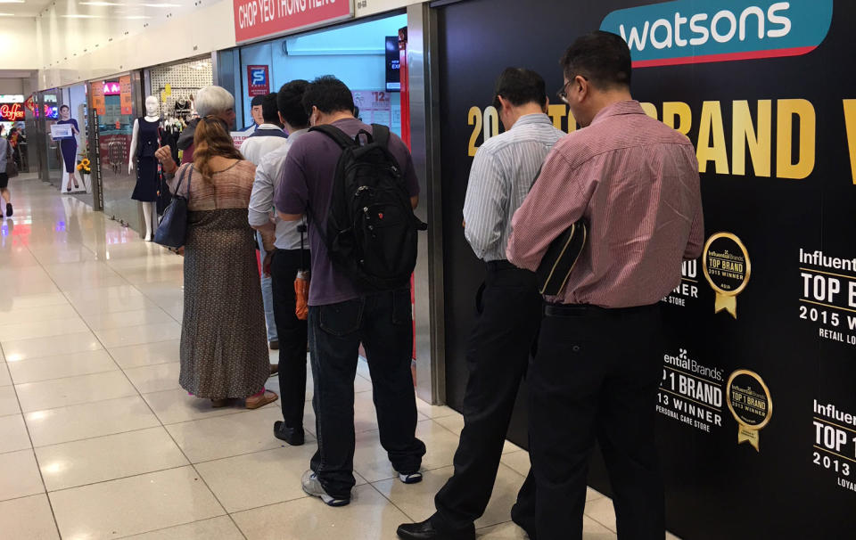 A TOTO queue outside a betting outlet. (Yahoo Singapore file photo)