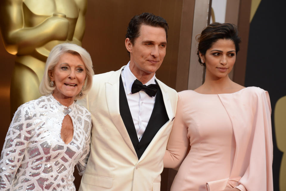 From left, Mary Kathlene McCabe, Matthew McConaughey and Camila Alves arrive at the Oscars on Sunday, March 2, 2014, at the Dolby Theatre in Los Angeles. (Photo by Jordan Strauss/Invision/AP)