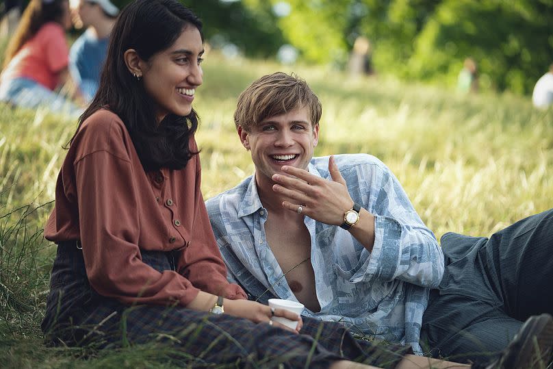 Ambika Mod, left, and Leo Woodall in a scene from the mini-series "One Day."