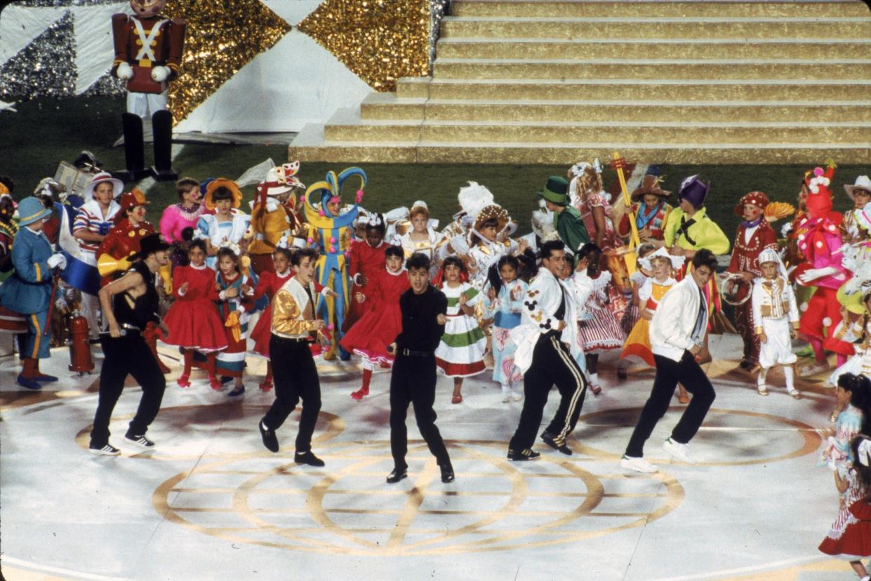 New Kids on the Block perform before the New York Giants take on the Buffalo Bills in Super Bowl XXV at Tampa Stadium on Jan. 27, 1991, in Tampa. The Giants defeated the Bills 20-19. (Photo by Gin Ellis/Getty Images)