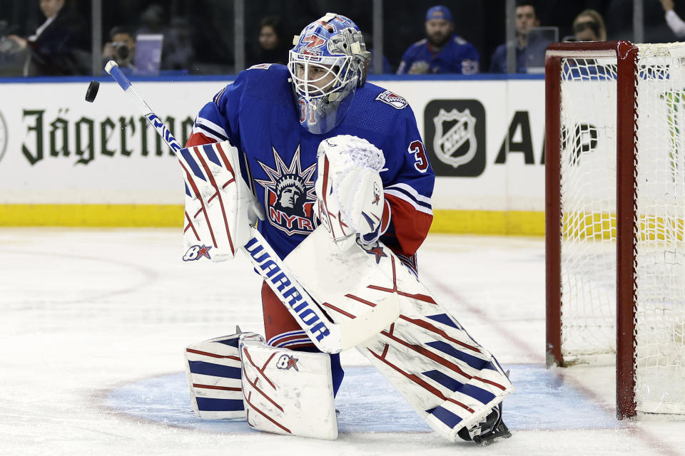 New York Rangers goaltender Igor Shesterkin makes a save against the Washington Capitals during the first period of an NHL hockey game Tuesday, Dec. 27, 2022, in New York. (AP Photo/Adam Hunger)