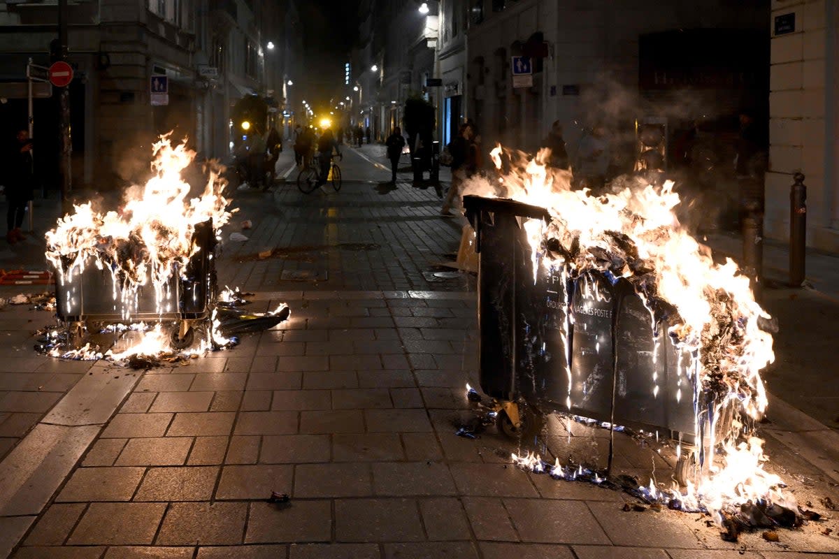 Household waste containers were set on fire during the protests (AFP/Getty)