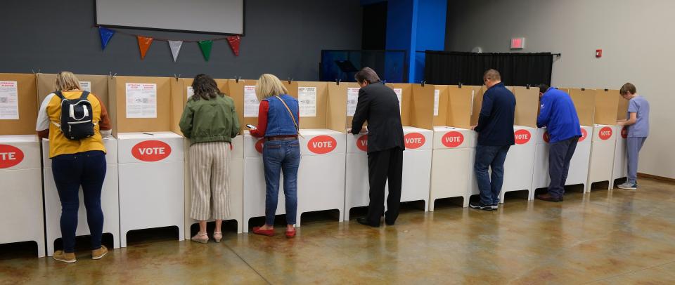 Voters in Precinct 360 mark their ballots in November 2022 at Edmond's Spring Creek Assembly of God.