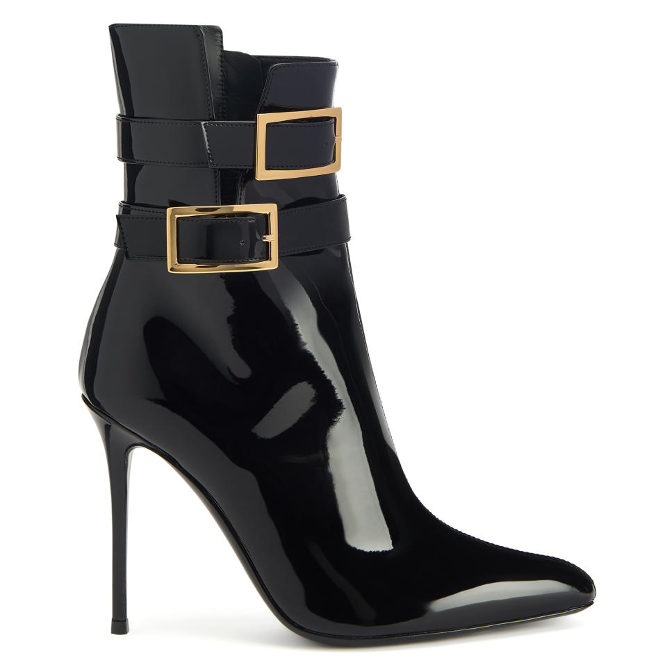Giuseppe Zanotti patent leather ankle boot with buckle hardware.
