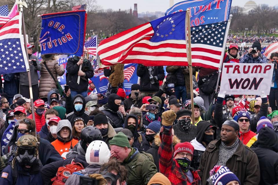 Rioters in Washington DC on 6 January, 2021 flood the US Capitol grounds. (AP)