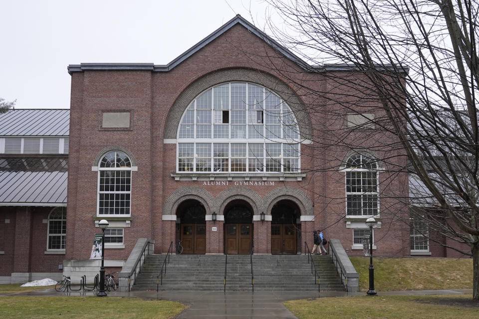 Students walk to Alumni Gymnasium on the campus of Dartmouth College, Tuesday, March 5, 2024, in Hanover, N.H. Dartmouth basketball players voted to form a union, an unprecedented step in the continued deterioration of the NCAA's amateur business model. (AP Photo/Robert F. Bukaty)