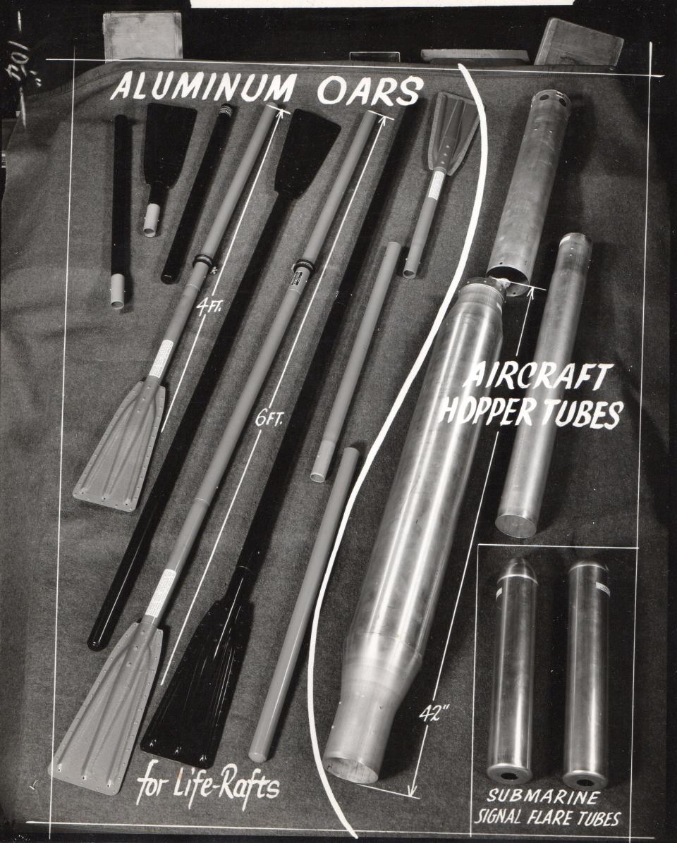 This photo from 1944 shows some of the items Mirro made for World War II. Some of the items include oars, hopper tubs and signal flare tubes.