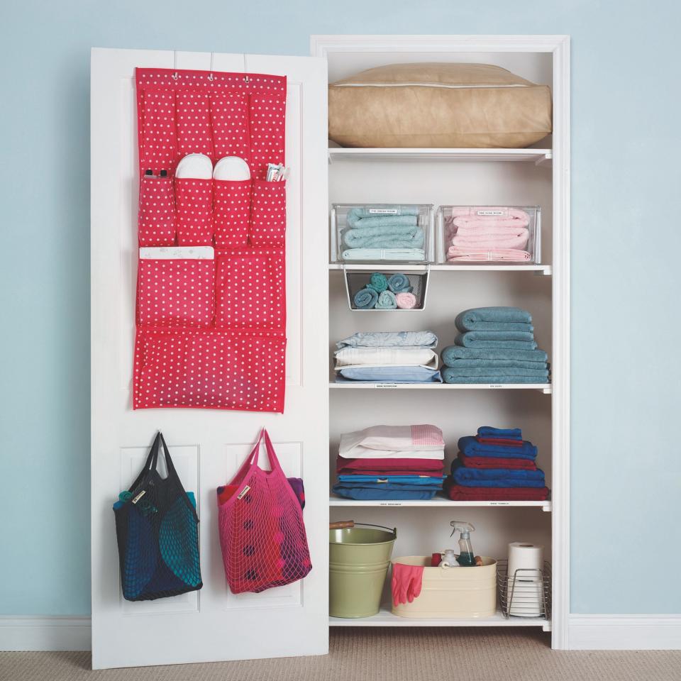 Organised wardrobe with open doors