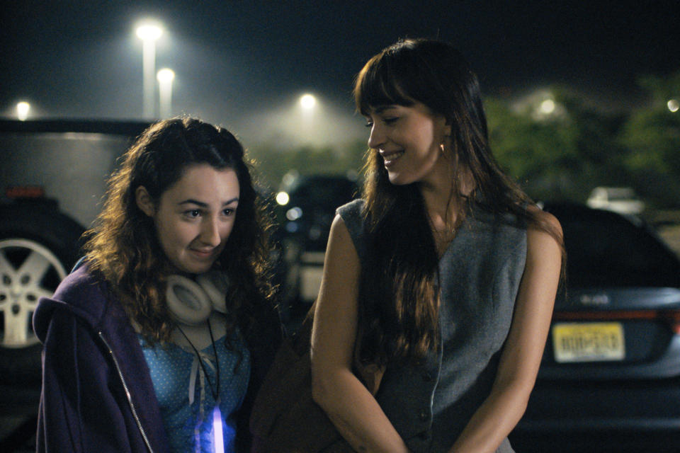 This image released by Apple TV+ shows Vanessa Burghardt, left, and Dakota Johnson in “Cha Cha Real Smooth,” premiering June 17, 2022. (Apple TV+ via AP)