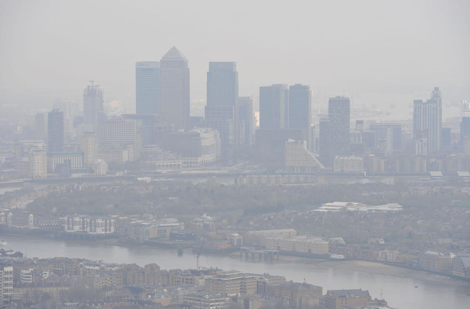 File photo dated 10/04/15 of air pollution over London. More than one in 19 deaths in UK towns and cities is linked to air pollution - and the figures are much worse for people living in the south, according to Centre for Cities charity.