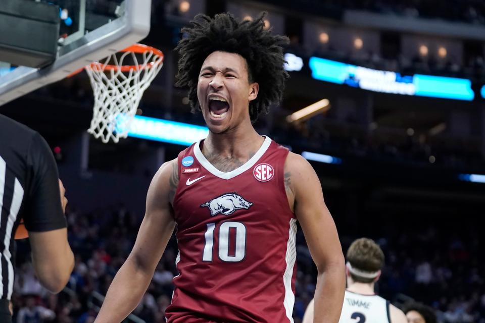 Arkansas forward Jaylin Williams reacts after dunking against Gonzaga during the first half of a college basketball game in the Sweet 16 round of the NCAA tournament in San Francisco, Thursday, March 24, 2022. (AP Photo/Marcio Jose Sanchez)