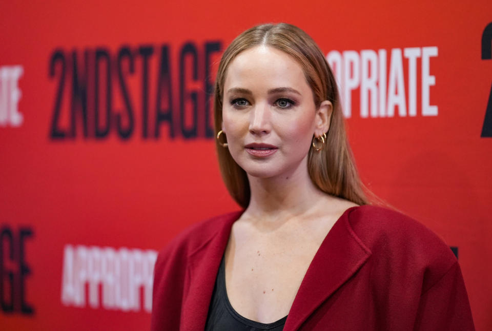 Close-up of JLaw at a media event