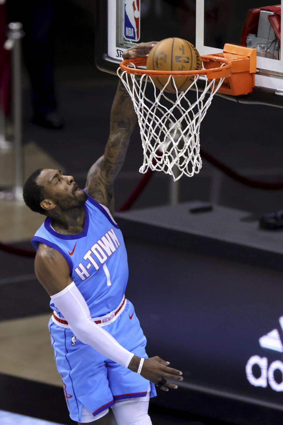 Houston Rockets' John Wall dunks against the Washington Wizards during the first half of an NBA basketball game Tuesday, Jan. 26, 2021, in Houston. (Carmen Mandato/Pool Photo via AP)