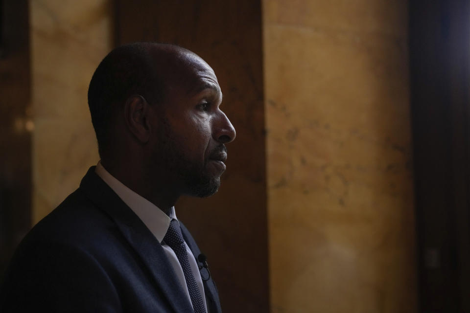 French Deputy of the National Assembly, Olivier Serva is photographed during an interview with The Associated Press, at the Nationial Assembly, in Paris, Wednesday, March 27, 2024. French lawmakers are debating a bill Thursday that would ban discrimination over the texture, length, color or style of someone's hair. (AP Photo/Thibault Camus)