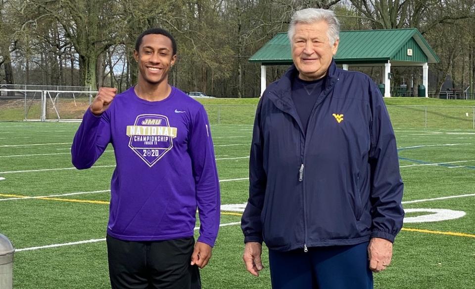 James Madison's Brandon Polk, left, with former Atlanta Falcons general manager Ken Herock during a makeshift pro day because of the COVID-19 pandemic. 