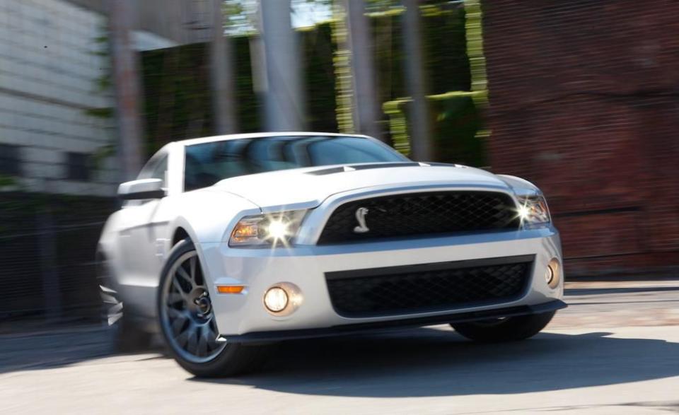 <p>The <a rel="nofollow noopener" href="https://www.caranddriver.com/reviews/2011-ford-mustang-shelby-gt500-road-test-review" target="_blank" data-ylk="slk:Shelby GT500 based on the fifth-generation Mustang;elm:context_link;itc:0;sec:content-canvas" class="link ">Shelby GT500 based on the fifth-generation Mustang</a> debuted for 2007 with a 500-hp supercharged V-8. That figure swelled to 540 horses for 2010 and then to 550 in 2011 when a new aluminum 5.4-liter mill replaced the original iron-block unit. A six-speed manual was the only transmission choice, and improvements in chassis tuning resulted in a better driving snake. Acceleration figures were inversely related to the increase in power, with the 2011 GT500 coupe being the quickest of the 5.4-liter cars, retuning a best of 4.1 seconds to 60 mph and a quarter-mile in 12.4 at 117 mph.<br></p>