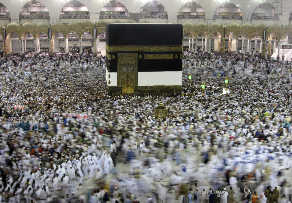 Muslim pilgrims circumambulate around the Kaaba, the cubic building at the Grand Mosque, ahead of the Hajj pilgrimage in the Muslim holy city of Mecca, Saudi Arabia, Wednesday, Aug. 7, 2019. The hajj occurs once a year during the Islamic lunar month of Dhul-Hijja, the 12th and final month of the Islamic calendar year. (AP Photo/Amr Nabil)