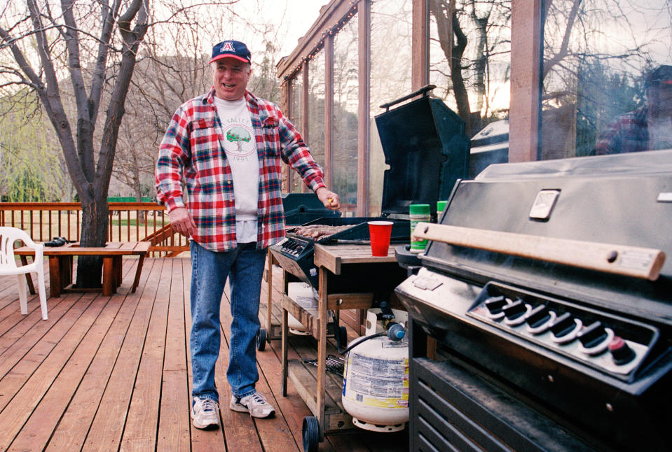 McCain barbecues at the McCain family ranch, near Sedona, in March 2000. (Photo by David Hume Kennerly/Getty Images)