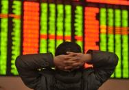 Global stocks begin 2016 with China growth hangover