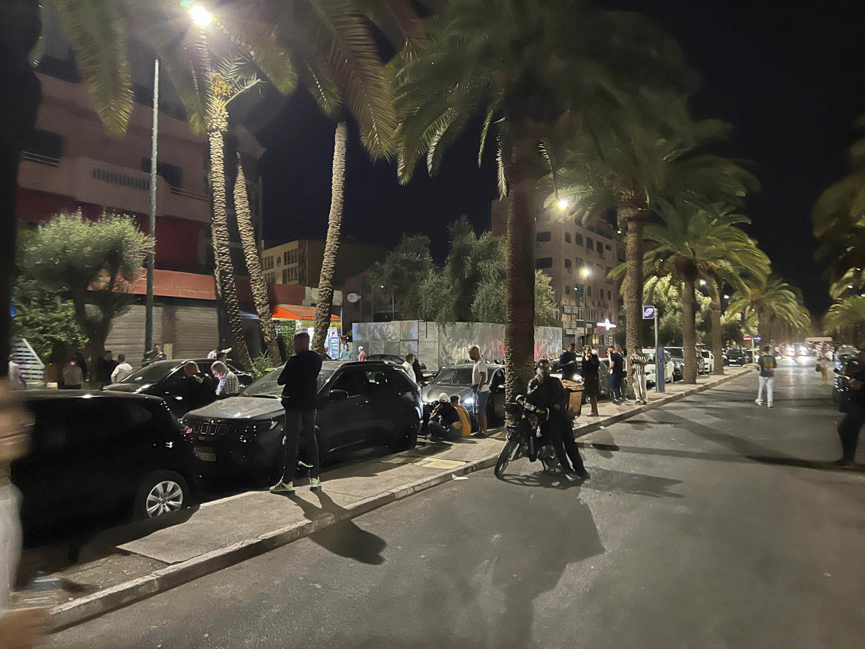 People take shelter after an earthquake in Marrakech, Morocco, Friday, Sept. 8, 2023. A rare, powerful earthquake struck Morocco late Friday night, killing hundreds of people and damaging buildings from villages in the Atlas Mountains to the historic city of Marrakech. (AP Photo)