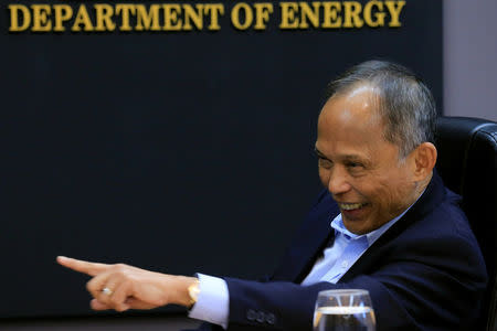 Philippine Department of Energy (DOE) Secretary Alfonso Cusi gestures during a Reuters interview at the DOE headquarters in Taguig city, Metro Manila, Philippines February 27, 2017. REUTERS/Romeo Ranoco