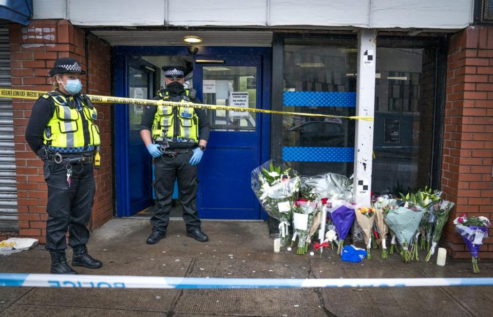 Police at the entrance to High Street Station in Glasgow (Jane Barlow/PA) (PA Wire)