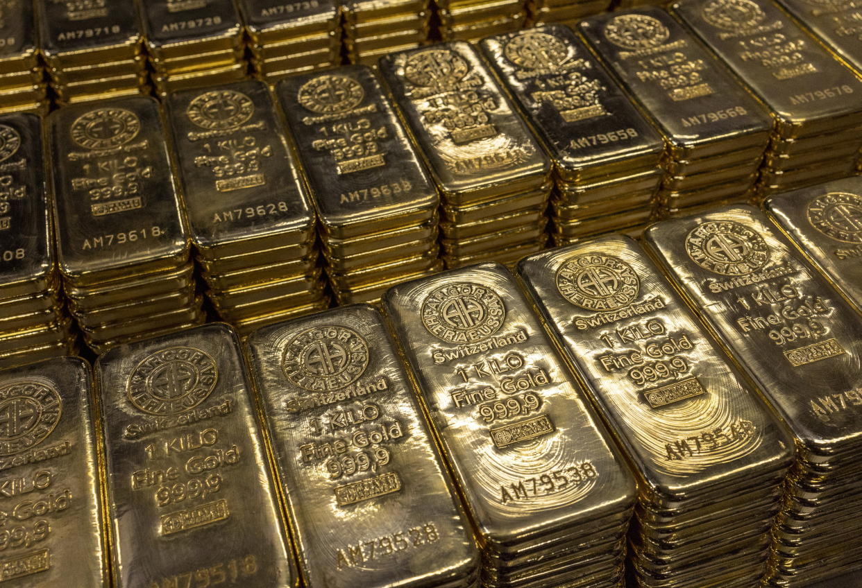 One kilo gold bars are pictured at the plant of gold and silver refiner and bar manufacturer Argor-Heraeus in Mendrisio, Switzerland, July 13, 2022. REUTERS/Denis Balibouse