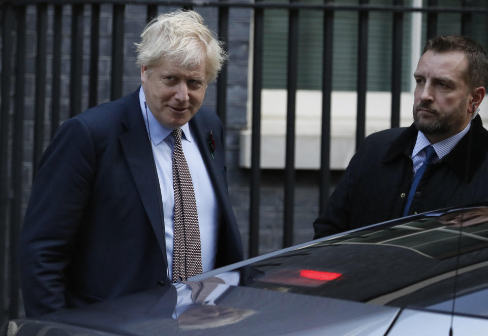 Britain's Prime Minister Boris Johnson leaves 10 Downing Street on route to Buckingham Palace to see Queen Elizabeth II to formally start the general election in London, Wednesday, Nov. 6, 2019. Britain goes to the polls on Dec.12. (AP Photo/Alastair Grant)