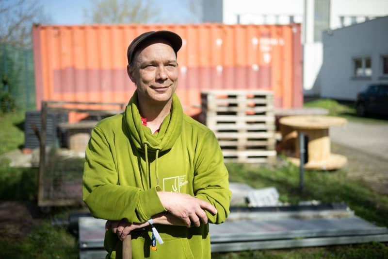 Torsten Dietrich, head of the Cannabis Social Club Berlin, stands on the site where the club's greenhouse for legal weed is to be constructed. Sebastian Christoph Gollnow/dpa