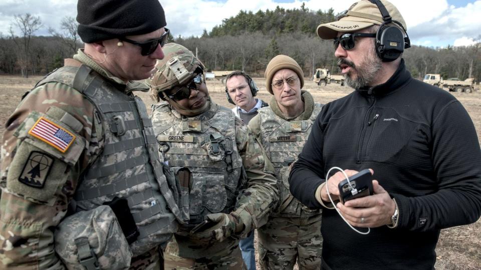 Brain trauma researchers visit soldiers from Wisconsin National Guard in April 2024 during training to discuss a planned study  to measure blast exposure effects among soldiers. (Staff Sgt. Kati Volkman/Army)