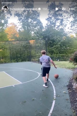 <p>Kim Zolciak-Biermann</p> Kim and Kroy's son Kash playing on the basketball court at their former Georgia abode.