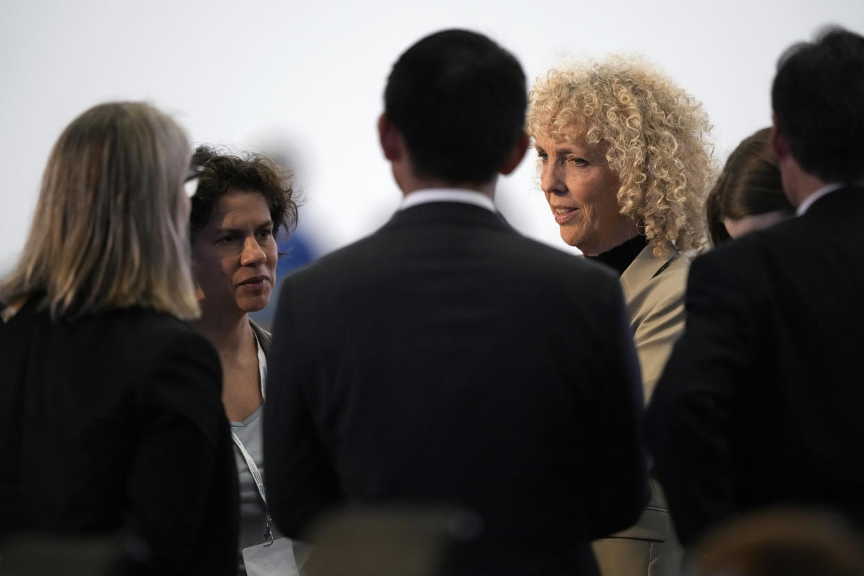 Maisa Rojas, minister of environment of Chile, left, and Germany's climate envoy Jennifer Morgan talk ahead of a closing plenary session at the COP27 U.N. Climate Summit, Sunday, Nov. 20, 2022, in Sharm el-Sheikh, Egypt. (AP Photo/Peter Dejong)