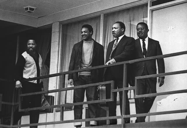 <p>AP Photo/Charles Kelly</p> The Rev. Martin Luther King Jr. stands with other civil rights leaders on the balcony of the Lorraine Motel in Memphis, Tenn., on April 3, 1968, a day before he was assassinated at approximately the same place.