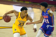 Arizona State forward Marcus Bagley (23) drives against Houston Baptist guard Pedro Castro during the first half of an NCAA college basketball game, Sunday, Nov. 29, 2020, in Tempe, Ariz. (AP Photo/Rick Scuteri)