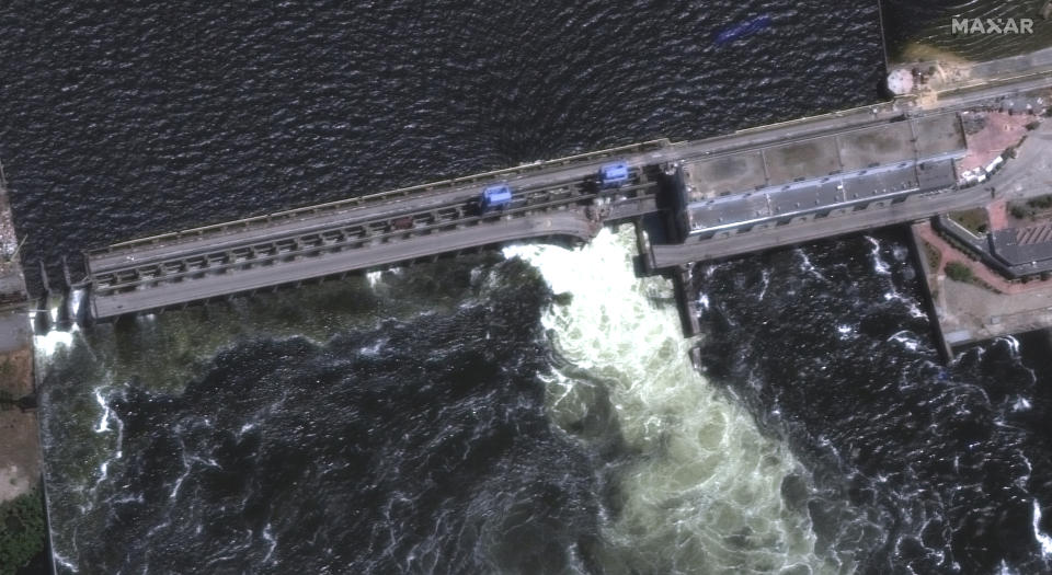 This satellite image provided by Maxar Technologies shows an overview of the Kakhovka dam in southern Ukraine on Monday, June 5, 2023. Ukraine on Tuesday, June 6, accused Russian forces of blowing up the major dam and hydroelectric power station in a part of southern Ukraine they control, threatening a massive flood that could displace hundreds of thousands of people, and ordered residents downriver to evacuate. Russian news agency Tass quoted an unspecified Russian government official as saying the dam had “collapsed” due to damage. (Maxar Technologies via AP)